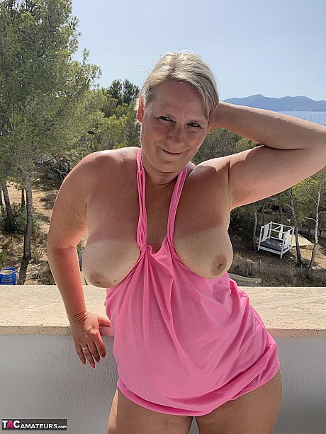 Thick old blondy twerks her large booty on a balcony after exposing herself - Image 16 of 19  in Amateur category   featuring Sweet Susi 