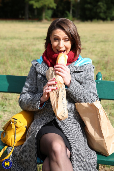 French mom Anya flashes her legs in pantyhose while eating a sandwich outside - #97328