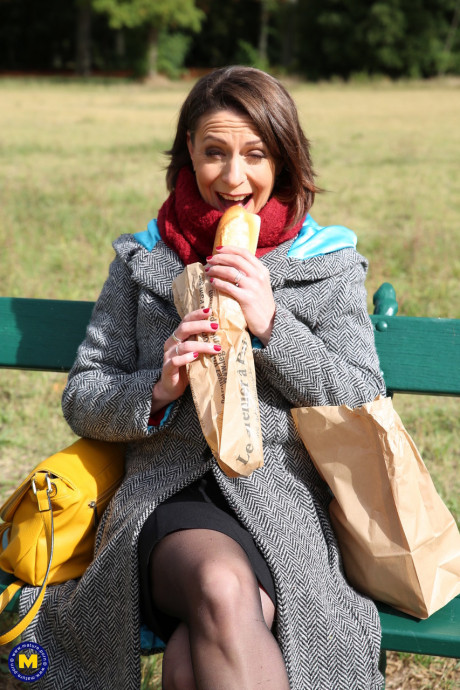 French mom Anya flashes her legs in pantyhose while eating a sandwich outside - #97329
