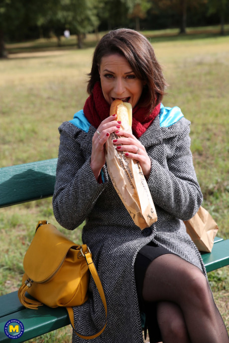 French mom Anya flashes her legs in pantyhose while eating a sandwich outside - #97330