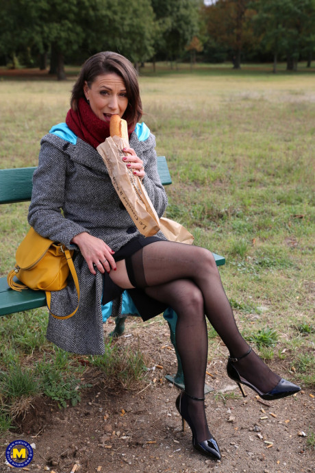 French mom Anya flashes her legs in pantyhose while eating a sandwich outside - #97332