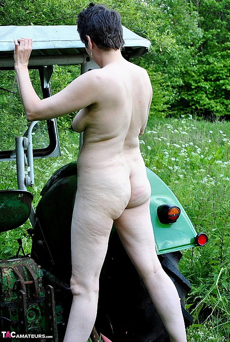 Old amateur HotMilf gets naked on a tractor during outdoor action - Image 15 of 16  in Outdoor category   featuring HotMilf 