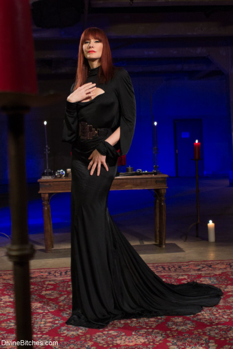 Nasty mistress Madeline Marlowe biting a male sub's meat in hot BDSM action - #1460926