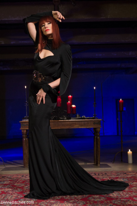 Nasty mistress Madeline Marlowe biting a male sub's meat in hot BDSM action - #1460927