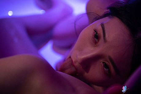 Asian masseuse Li Er teases with her enormous boobs during a sensual massage session - Image 11 of 21  in Ass category   featuring Li Er 