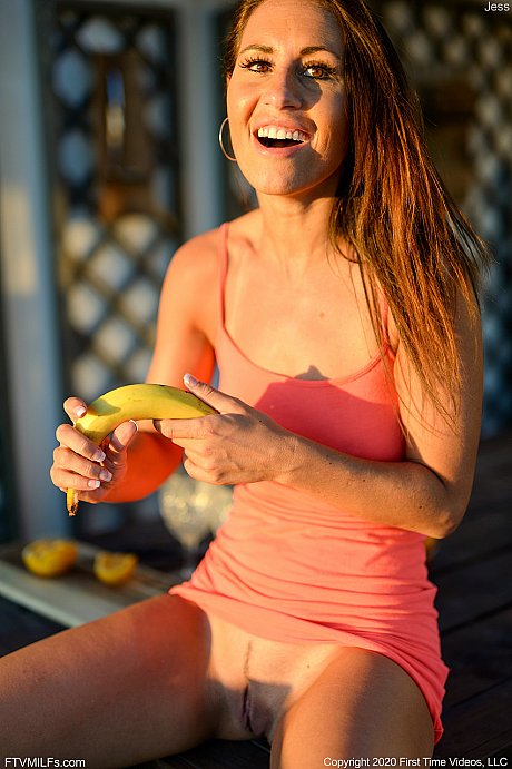 Lusty amateur MILF Jess toys her vagina with a banana on an outdoor bench - Image 6 of 21  in Pussy category   featuring Jess West 