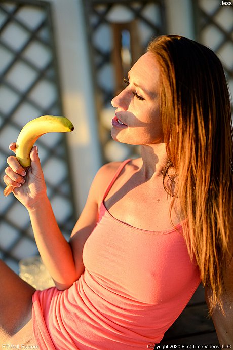 Lusty amateur MILF Jess toys her vagina with a banana on an outdoor bench - Image 7 of 21  in Pussy category   featuring Jess West 