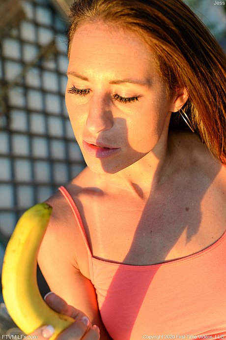 Lusty amateur MILF Jess toys her vagina with a banana on an outdoor bench - Image 18 of 21  in Pussy category   featuring Jess West 