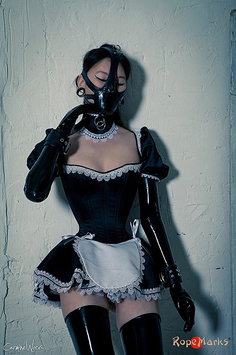 Korean model poses for a solo shoot in a kinky rubber maid outfit - Image 14 of 16  in Legs category  