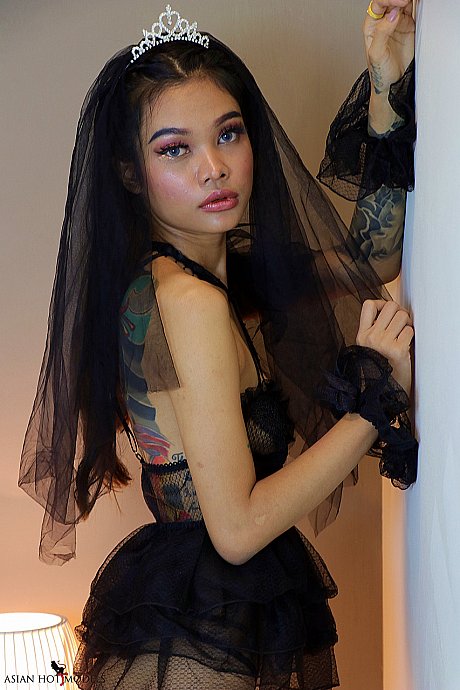 Little Princess Nuchcy poses in a seductive undergarment and lacy fishnets - Image 10 of 19  in Babe category   featuring Nuchcy 