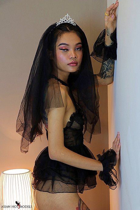 Little Princess Nuchcy poses in a seductive undergarment and lacy fishnets - Image 13 of 19  in Babe category   featuring Nuchcy 