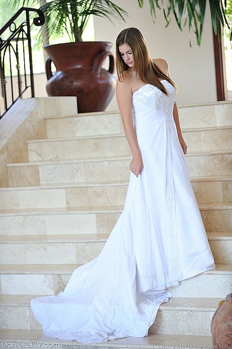Busty glamorous amateur Danielle models wedding gown indoors & by the pool - Image 1 of 16  in Outdoor category   featuring Danielle 