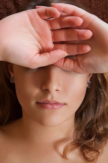 Adorable young Nikia A flaunts her titteis and bald cunt on the floor - Image 18 of 20  in Model category   featuring Nikia A 