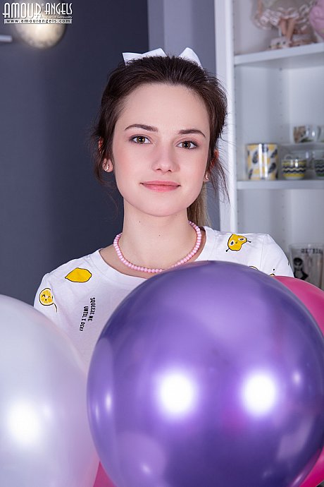 Adorable young Trinity holds balloons while getting nude in OTK pantyhose - Image 2 of 20  in Pussy category   featuring Trinity 