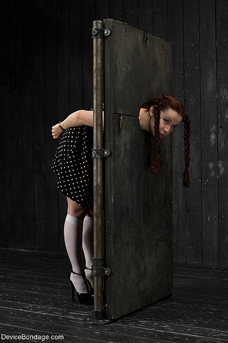 Young AnnaBelle Lee gets humiliated while being trapped in a standing stock - Image 5 of 20  in Pussy category   featuring Annabelle Lee, Claire Adams 