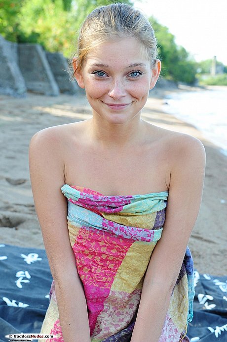 Cutie with blue eyes and innocent smile Indi shows teen body off on the beach - Image 11 of 16  in Model category   featuring Indi 