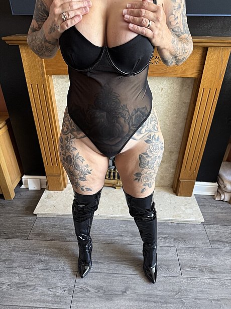 Tattooed blondy Inked MILF gets nude in over the knee latex boots - Image 6 of 16  in Close Up category   featuring Inked MILF 