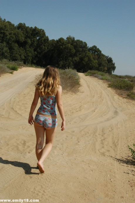 Pretty young teenie lady gf woman exposes her behind crack while alone on a dirt road - #360802
