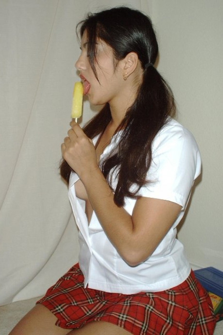 Pigtailed Indian honey Sunny Leone rubs her twat while eating a popsicle - #291151