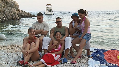 Things heat up at the beach when a sizzling naked threesome leads to DP - Image 1 of 15  in Outdoor category  