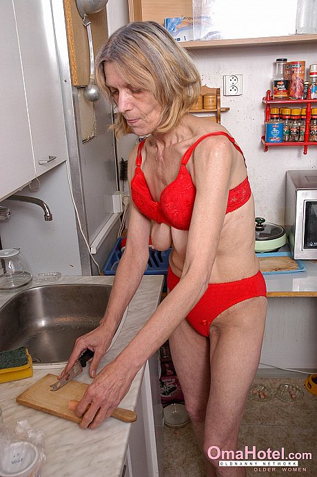 Yellow-haired grandma Helene doffs her red dress and masturbates in the kitchen
