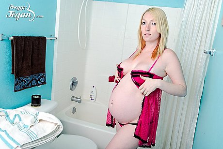 Solo lady girl girl shows her heavily pregnant belly while taking a shower - Image 3 of 10  in Close Up category   featuring Tegan Riley 