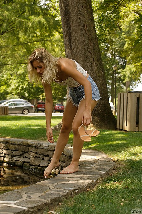 Hot babe Jezebel Madd shows off her hot legs wearing ass shorts outdoors - Image 5 of 12  in Babe category   featuring Jezebel Madd 
