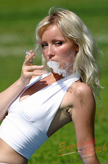 Hot yellow-haired smokes a cigarette during upskirt action on a public bench - Image 8 of 15  in Outdoor category  