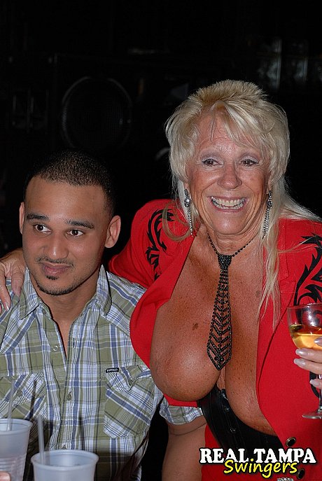 Mature swinger Tracy suck swallows a busty MILF's vagina & gives a blowjob at a club - Image 15 of 21  in Spreading category   featuring Tracy Licks, Mandi Mcgraw, Rebecca Williams 