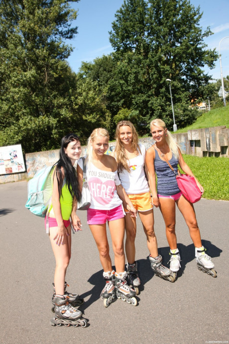 Four pretty teens expose their petite bodies and small titties on roller blades - #95247