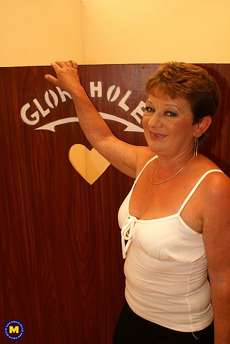Horny old lady with small melons Nicolien takes a penis through a gloryhole - Image 1 of 21  in Fetish category   featuring Nicolien 
