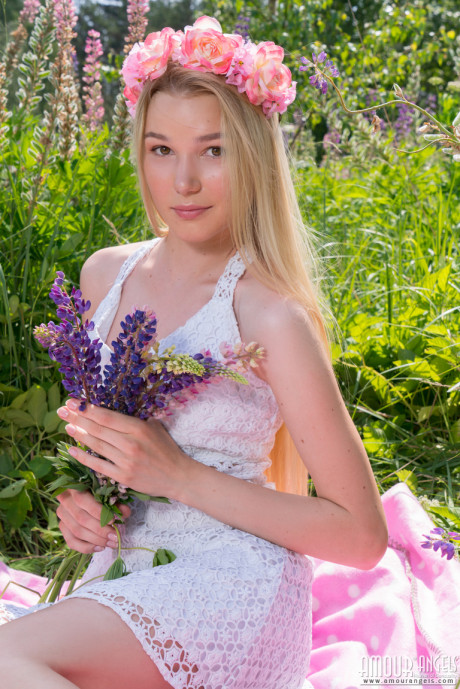 Young young blondie wears a crown of flowers during her undressed debut amid fireweed - #1087315