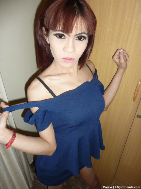 Skinny transexual Preaw spreads her behind after getting undressed at home on her bed - #1301841