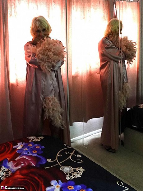 Yellow-haired grandma Sparkle exposes her saggy titties and shaved twat in a satin robe - Image 12 of 16  in Pussy category   featuring Sparkle 