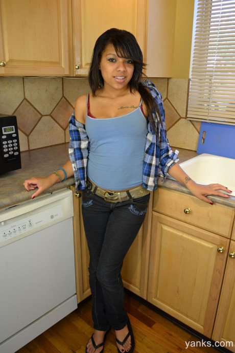 Amateur ebony young Kimberly Marie stimulates her black clitoris in the kitchen - #321657