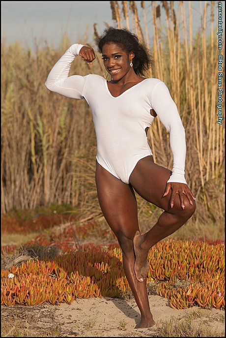 Ebony bodybuilder Jaquita Person Taylor flexes her ripped body while outdoors - Image 10 of 15  in Outdoor category   featuring Jaquita Person Taylor 