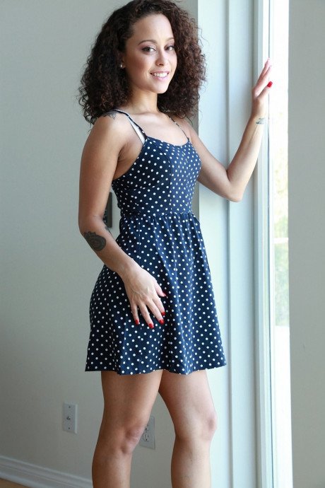 Curly haired black teenie Mia Austin disrobes and bares her shaved snatch - #1209705