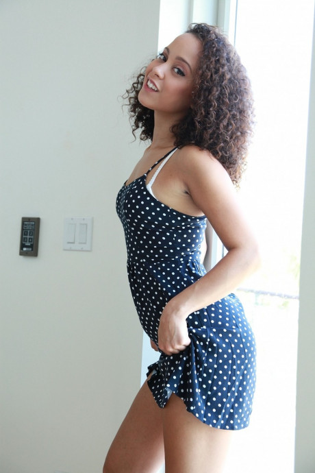 Curly haired black teenie Mia Austin disrobes and bares her shaved snatch - #1209706
