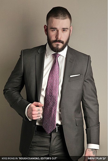 Muscular gay Kris Irons shows his uncut dick while posing in a suit - Image 14 of 20  in Gay category  