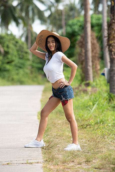 Young teenie oriental babe Kahlisa reveals her incredible breasts & oils her body outdoors - Image 1 of 20  in Teen category   featuring Kahlisa 