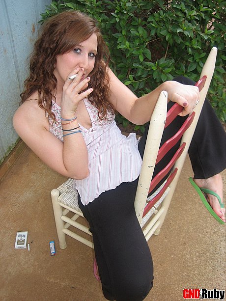 Young teenie ginger head flashes a boob while having a cigarette on a back porch - Image 7 of 12  in Outdoor category  