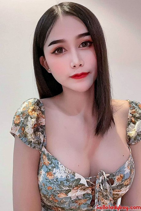 Attractive chinese ladyboy Bella shows her cleavage in her solo compilation - Image 4 of 20  in Ladyboy category   featuring Ladyboy Bella 