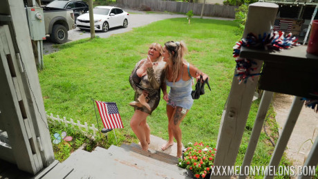 Chubby lesbian MILFs with giant titties engage in wild strapon group sex