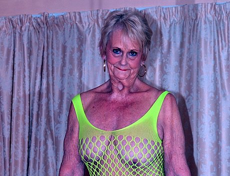 Blondy grandmother Sparkle models a revealing outfit on her bed - Gallery #46304