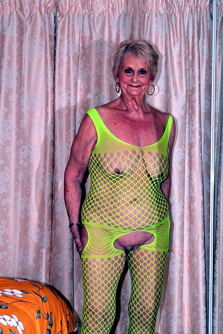 Blondy grandmother Sparkle models a revealing outfit on her bed - Image 4 of 15  in Pussy category   featuring Sparkle 