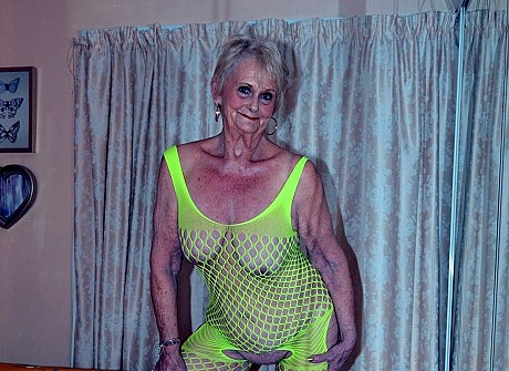Blondy grandmother Sparkle models a revealing outfit on her bed - Image 6 of 15  in Pussy category   featuring Sparkle 