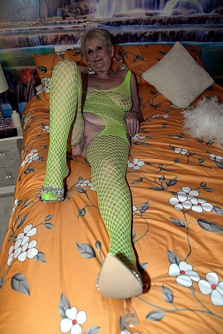 Blondy grandmother Sparkle models a revealing outfit on her bed - Image 14 of 15  in Pussy category   featuring Sparkle 