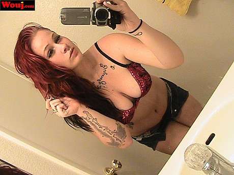 Redheaded amateur babe WouJ teases with her hot cleavage in the mirror - Image 10 of 15  in Babe category   featuring Mia Rosette 