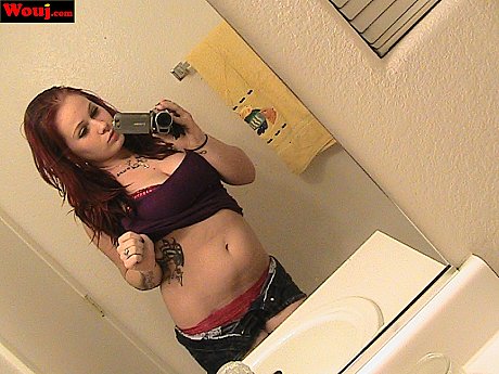 Redheaded amateur babe WouJ teases with her hot cleavage in the mirror - Gallery #34402