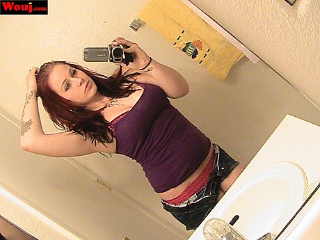 Redheaded amateur babe WouJ teases with her hot cleavage in the mirror - Image 14 of 15  in Babe category   featuring Mia Rosette 